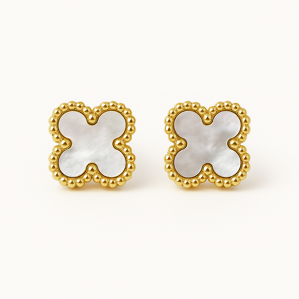 A pair of gold-tone clover-shaped stud earrings with mother of pearl inlays.