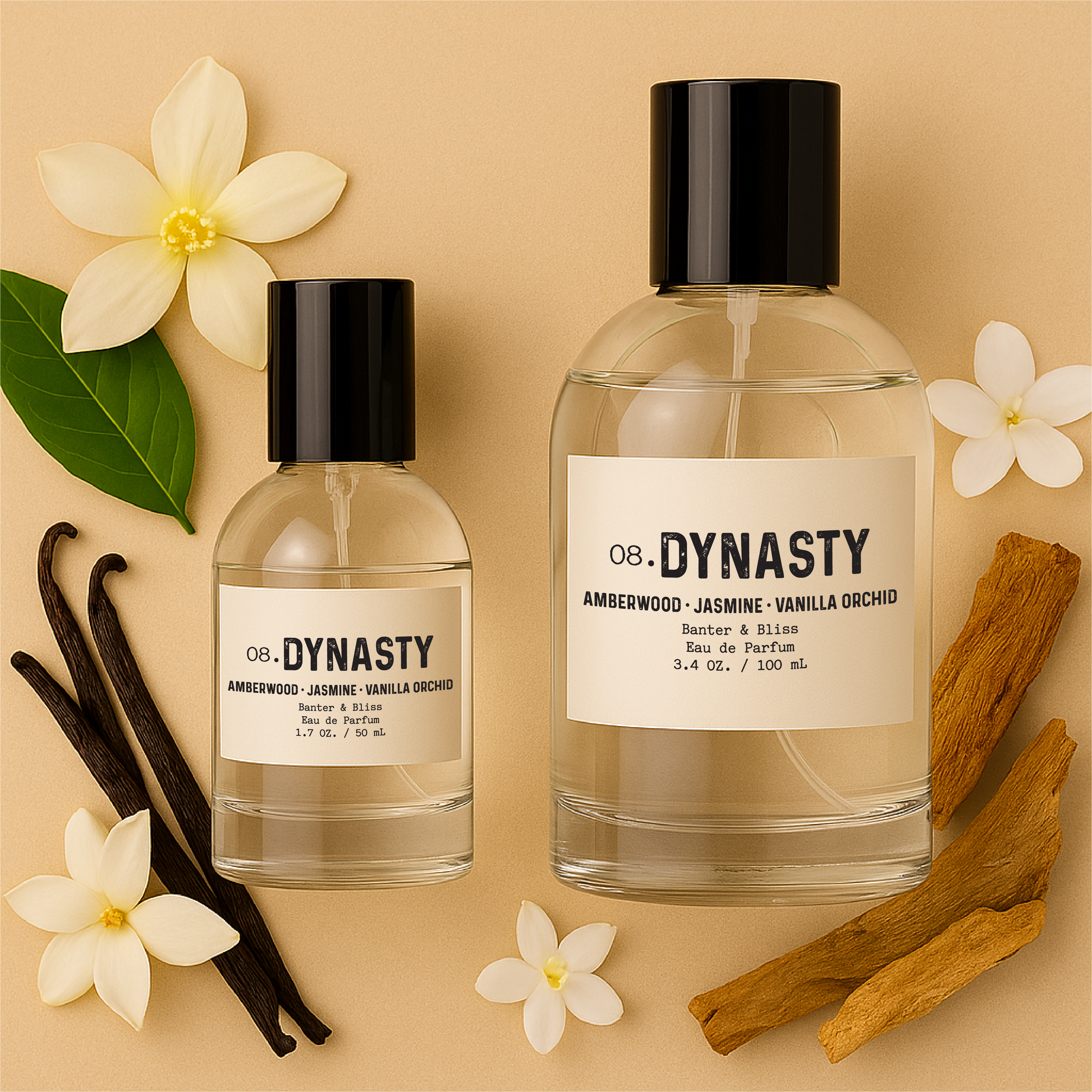 Two clear glass perfume bottles labeled "Dynasty" by Banter & Bliss are displayed against a warm beige pastel background. Surrounded by natural elements representing the scent notes—vanilla orchid flowers, jasmine blossoms, dried amberwood, and vanilla beans.