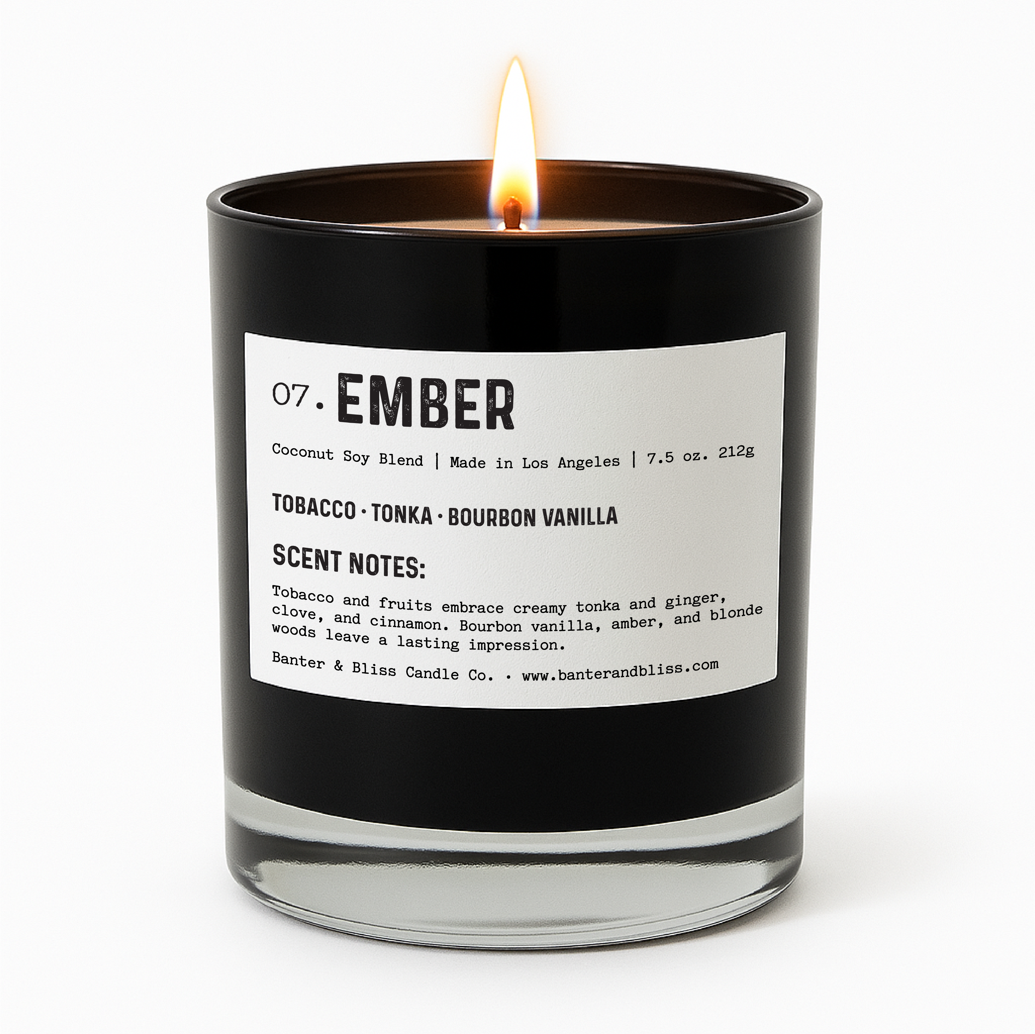 Banter & Bliss Candle Co. "Ember" luxury black candle with a lit flame, featuring scent notes of tobacco, tonka, and bourbon vanilla, made with a coconut soy blend in Los Angeles – minimalist product photo on white background.