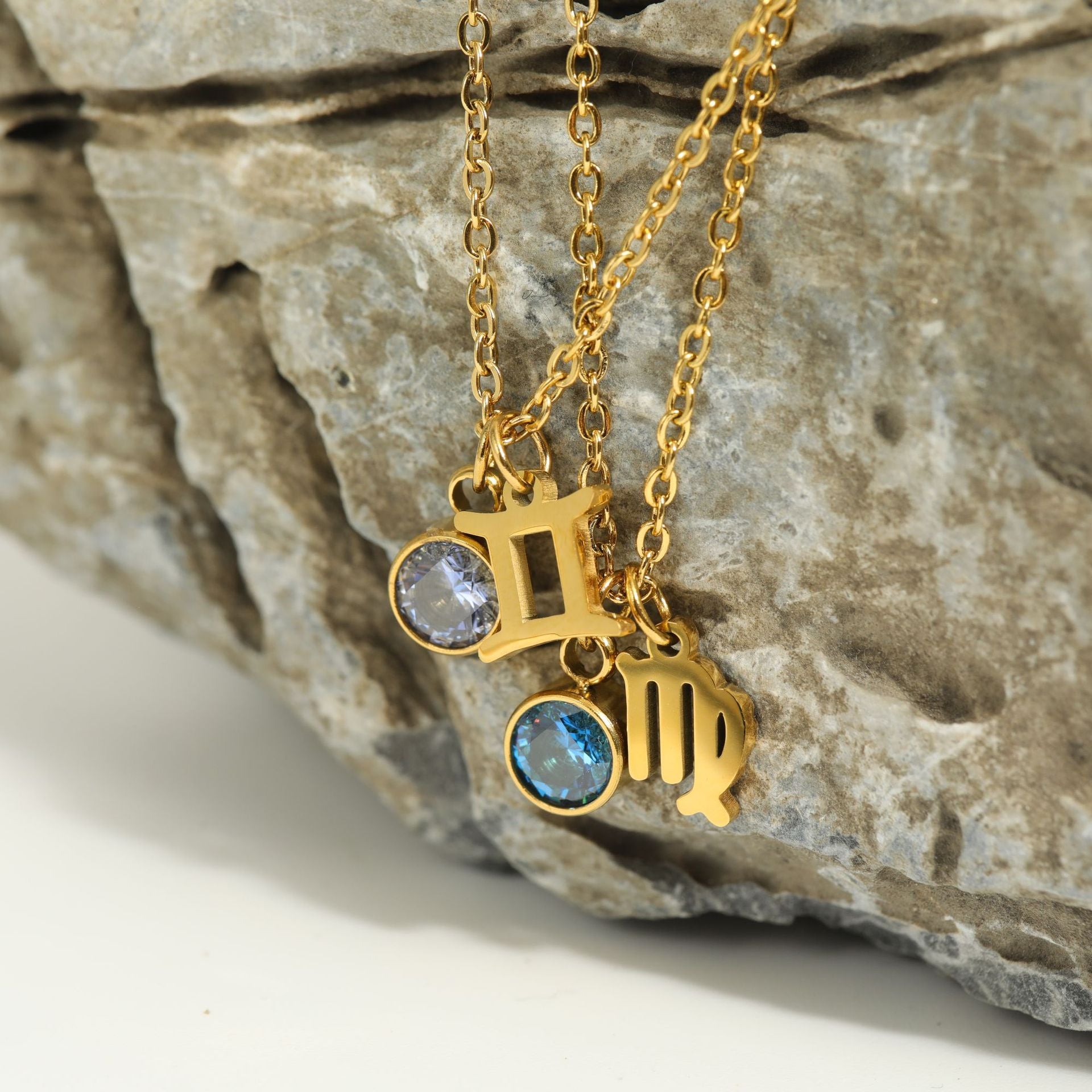 Close up of Zodiac Necklaces on Display
