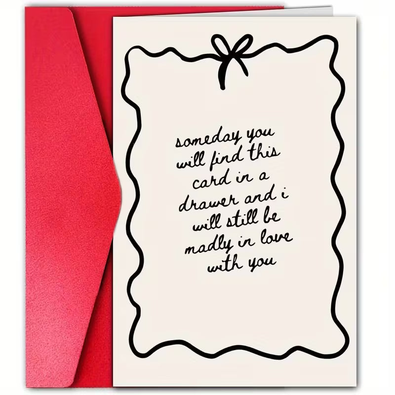 Greeting card with romantic message and red envelope